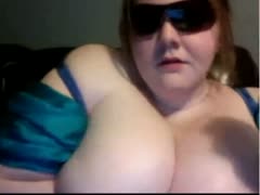 Fat and skanky white slut in sunglasses on the cam 